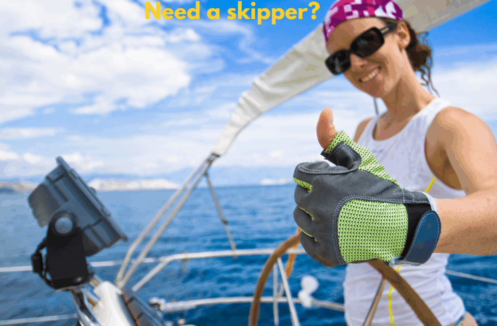 Professional skipper steering a catamaran with guests relaxing on deck in Greek islands